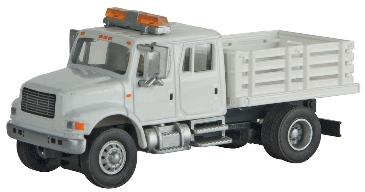 Walthers SceneMaster HO 949-11894 International 4900 Crew Cab Open Stake Bed Utility Truck White Assembled